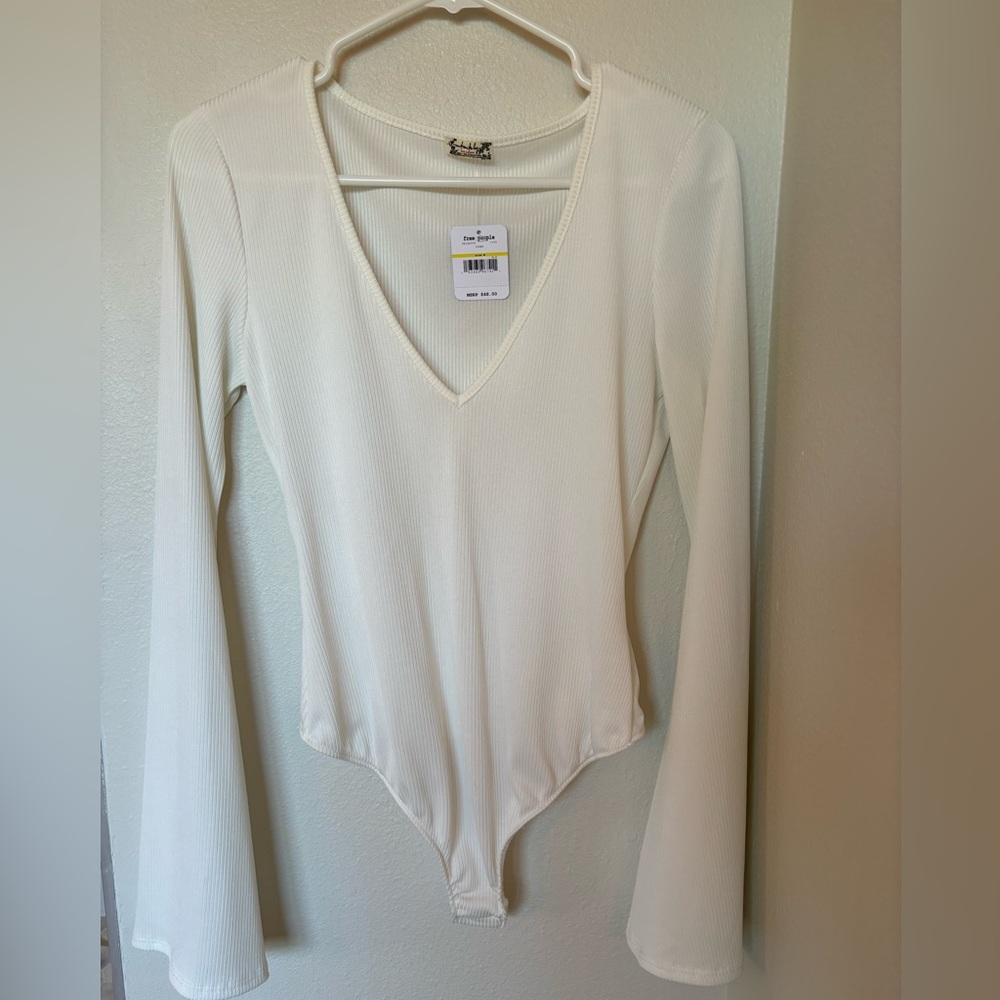 Women’s white bodysuit free people size medium